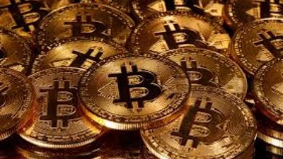 لأول مرة.. بيتكوين تقترب من الـ50 ألف دولار