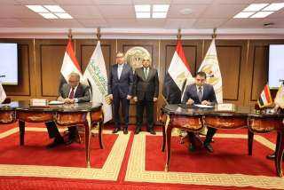 توقيع بروتوكول تعاون بين وزارة العدل والبنك الأهلي المصـري