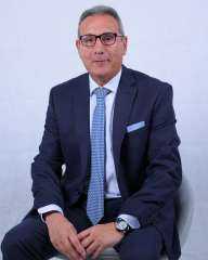محمد الإتربي.. مسيرة مصرفية حافلة تقود البنك الأهلي المصري نحو آفاق جديدة